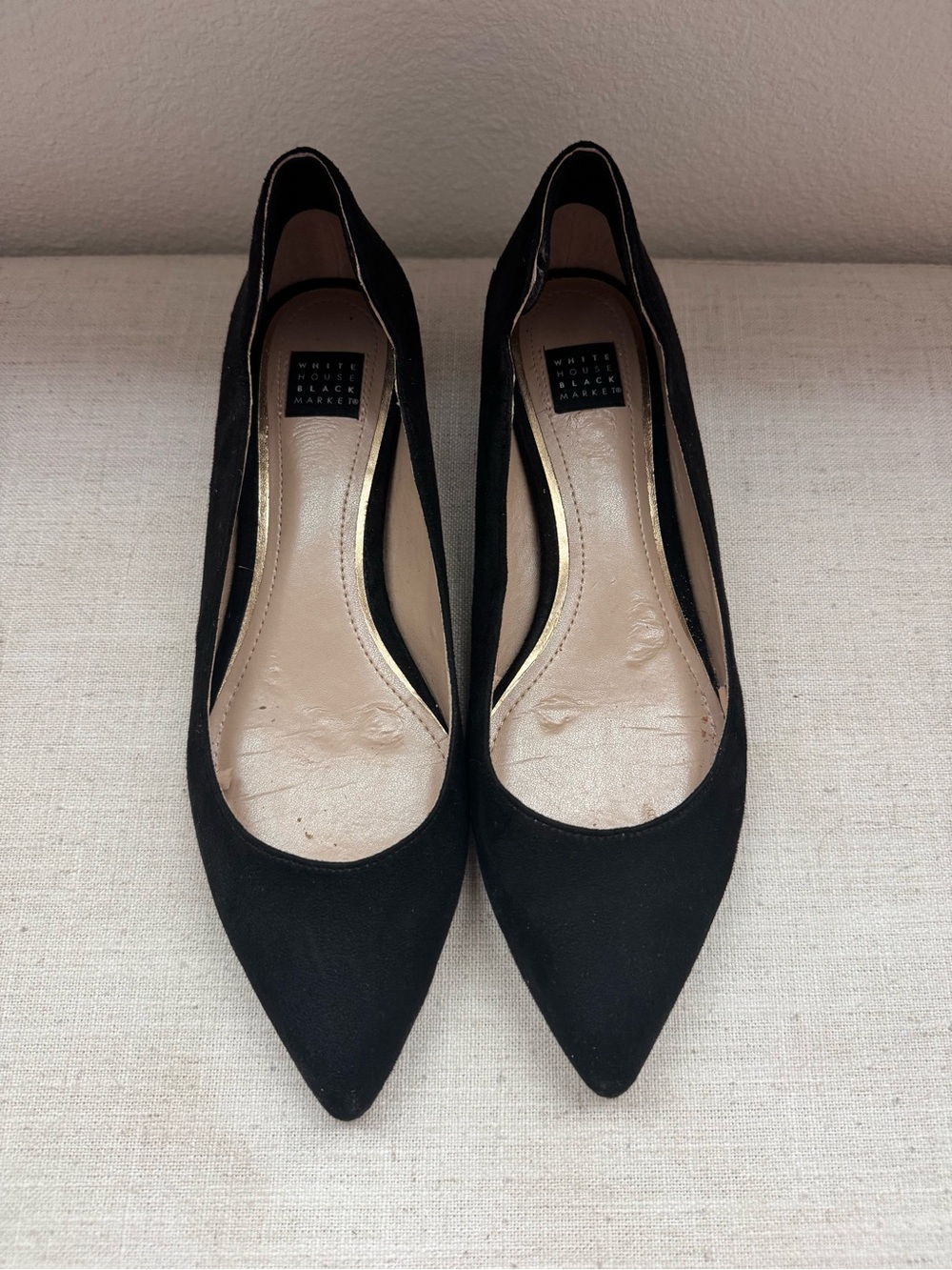 White House Black Market Black Pointed Toe Flats with Gold Trim
